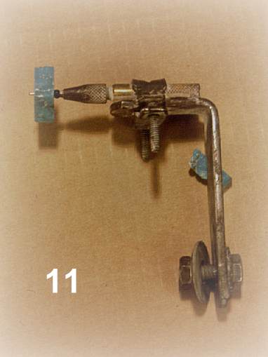 Turquoise bead on home made bead making tool