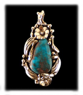 Here is a 14k gold and Bisbee Turquoise necklace