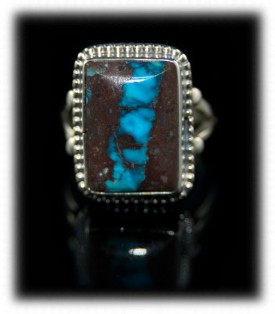 Pictured here is a Navajo native American handmade Bisbee Ribbon Turquoise and Sterling Silver ring