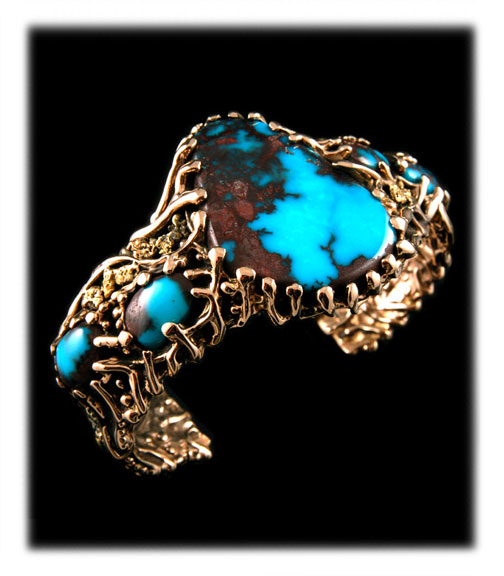 Pictured here is an outrageous American handcrafted mens bracelet by John Hartman just a great example of gold turquoise jewelry by Durango Silver Company of Colorado, USA which would go great with a mens watch