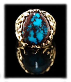 Picture here is one of John Hartman's high end Bisbee Turquoise Mens Gold Ring which was a custom order piece