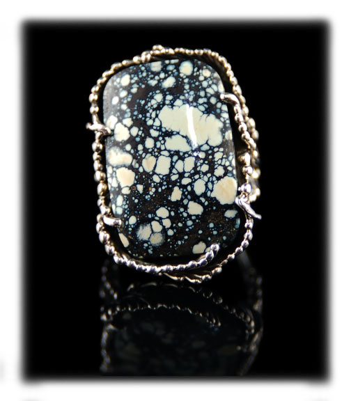 Colorback Spiderweb Turquoise Cabochon in a silver ring