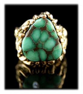 Shown here is a one of a kind museum quality natural Damele Mens Gold Ring by John Hartman