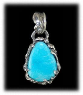 Lost Wax Sterling Silver and Sleeping Beauty Turquoise amulet