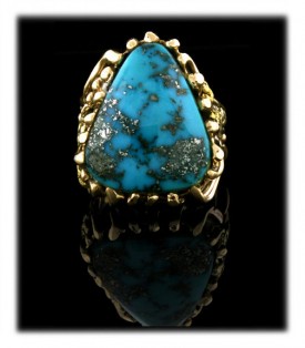 Shown here is a fine example of a Morenci Turquoise Mens Gold Ring which is a one of a kind work of art by the Hartman family