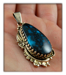 Paiute Turquoise pendant in gold and silver