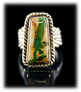 Pictured here is an American handmade Sterling Silver Ring with natural green Royston Boulder Turquoise