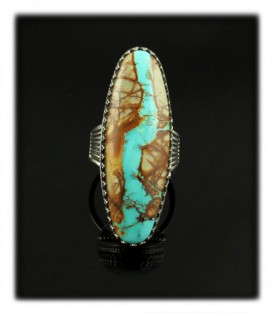 Large cocktail ring with a huge oval shaped ribbon Turquoise cabochon from the Royston Turquoise mine in Tonopah, Nevada USA