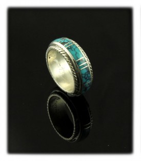 Tibetan Spiderweb Turquoise in a silver band by Stanley Manygoats