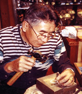 Silversmith making Silver Jewellery