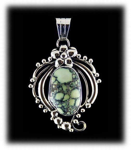 Tortoise Spiderweb Turquoise Cabochon in a Sterling Silver amulet