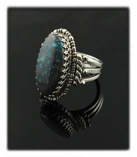 Pictured here is a wonderful handmade Sterling Silver ring with natural Bisbee Turquoise from Arizona, USA by John Hartman