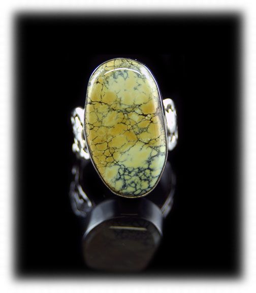 Golden Yellow Spiderweb Tortoise Turquoise cabochon in a Sterling Silver ring